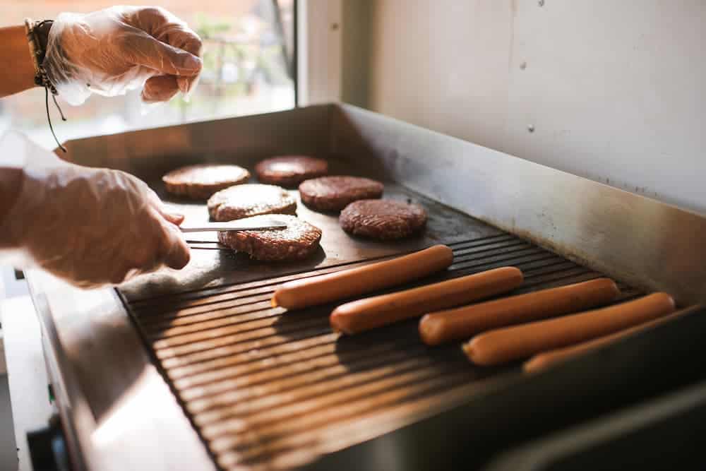 Hotdogs and burgers on the grill